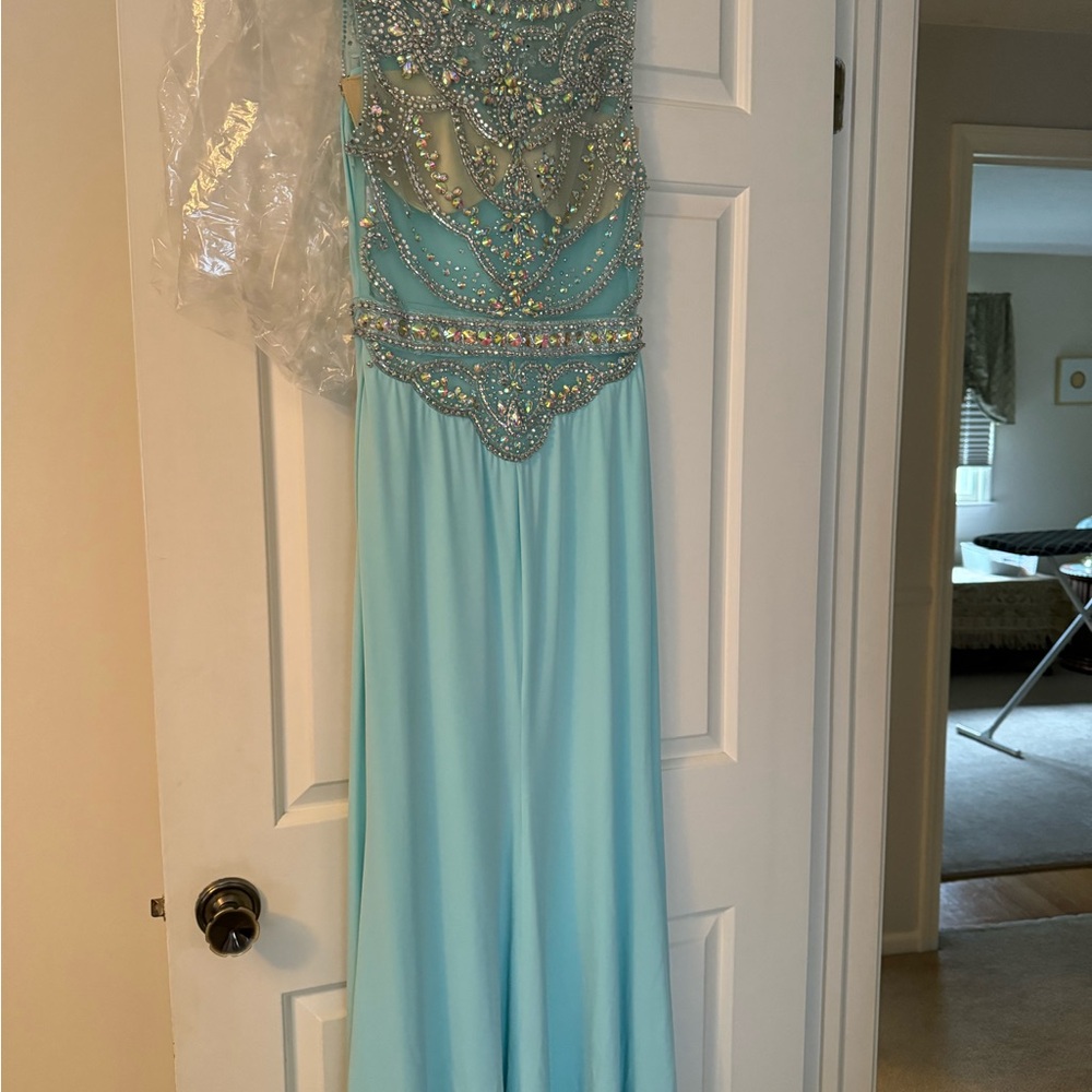 Sea foam green beaded and prom dress.